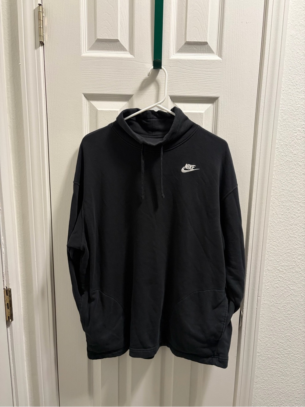 Nike Women’s Black Pullover Hoodie with White Swoosh (Oversized)